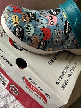 Skechers Slip-On Clog with Multicolor Cat Pattern - Light Blue Teal